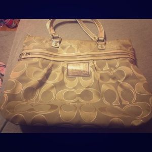 Used silver coach poppy purse.